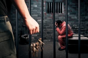 Dark and grungy prison cell at night